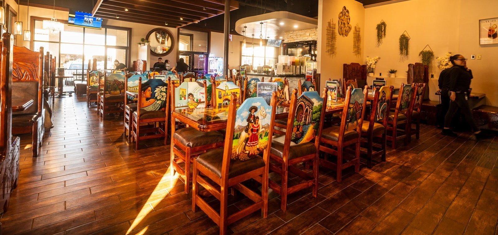 Mi Pueblo dining room with hand-painted wooden chairs